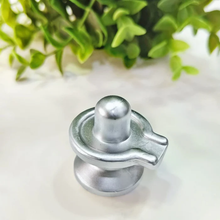 Load image into Gallery viewer, Top-shot realistic photo of a Parad Mercury Shivling with smooth polished silver surface.
