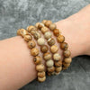 Picture Jasper Bracelet – Healing Crystal Jewellery for Creativity, Grounding & Inner Strength - On Hand View | Natural Red Jasper Crystal Bracelet for Calmness & Stress Relief