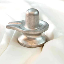 Load image into Gallery viewer, Premium Parad Shivling captured on a white blanket in a clean, realistic metallic photo shot.
