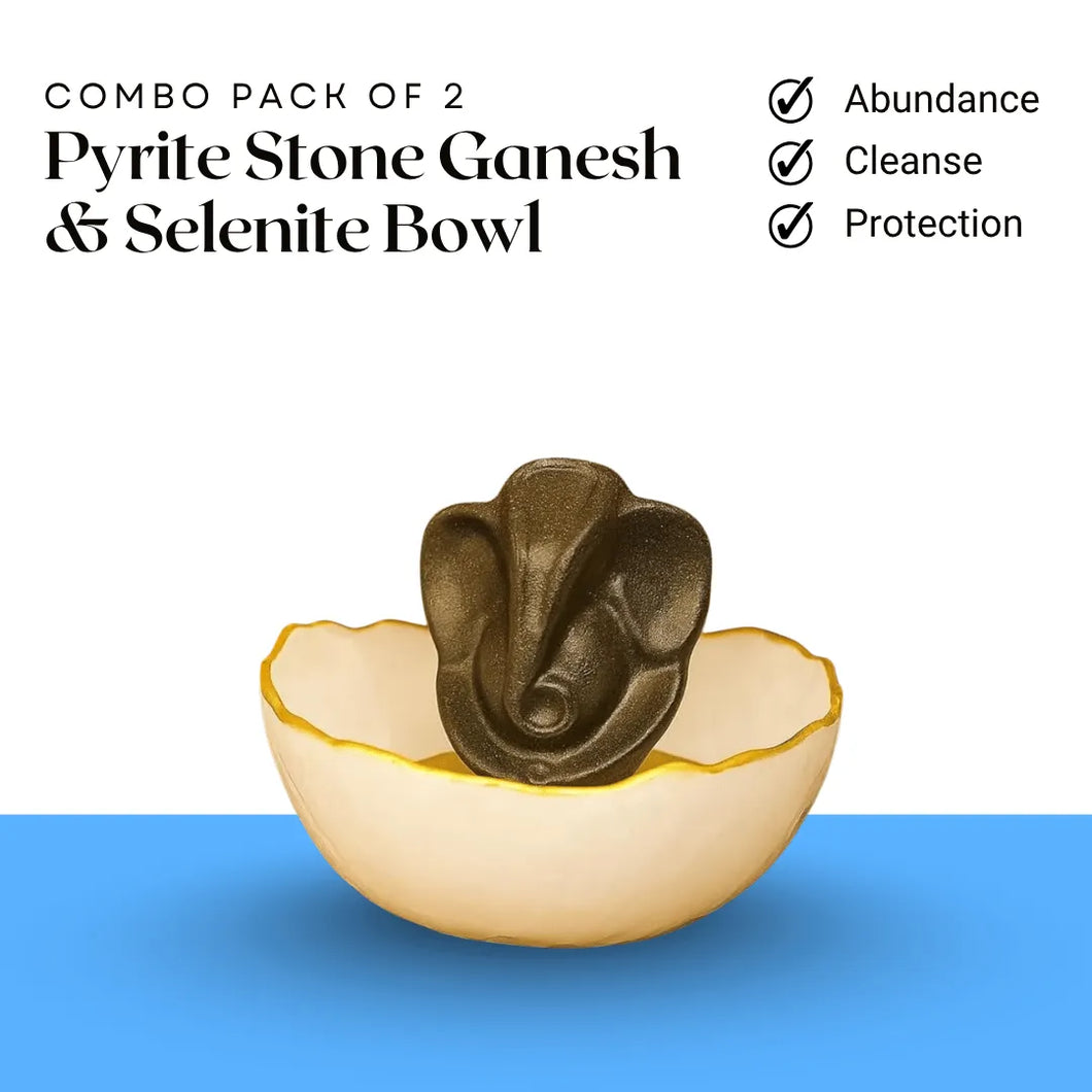Pyrite Stone Lord Ganesha statue placed inside a Selenite bowl for spiritual healing