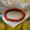 Motivation & Self-Belief - Red Sunstone Bracelet for drive, vitality, and a stronger sense of personal momentum - Packaging View | Natural Seven Chakra Crystal Bracelet for Success, Confidence & Career Growth