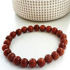 Motivation & Self-Belief - Red Sunstone Bracelet for drive, vitality, and a stronger sense of personal momentum - Scale Reference | Natural Seven Chakra Crystal Bracelet for Success, Confidence & Career Growth