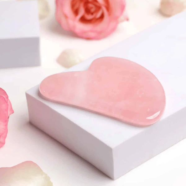 Rose Quartz beauty Gua Sha crystal featured for enhancing skin smoothness, radiance, and love energy.