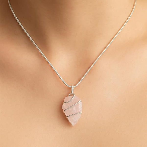 Rose quartz crystal arrowhead necklace designed for spiritual jewelry and self-love