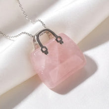 Load image into Gallery viewer, Rose Quartz Mini Handbag Pendant – Symbol of Love, Gentleness, and Comfort – Perfect for Daily Wear - Scale Reference | Natural Rose Quartz, Seven Chakra Crystal Ring for Love &amp; Relationship Harmony

