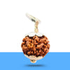 1 Mukhi Rudraksha pendant on a smooth white surface.