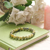 Protection & Emotional Wellness - Serpentine Bracelet for calm energy and daily balance - Lifestyle View | Natural Seven Chakra Crystal Bracelet for Evil Eye Protection & Negative Energy Shield