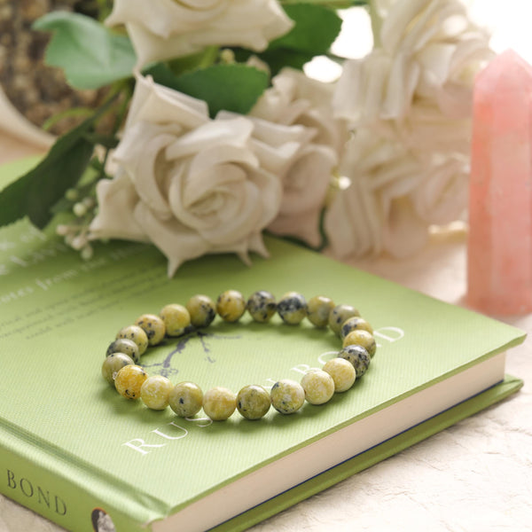Protection & Emotional Wellness - Serpentine Bracelet for calm energy and daily balance - Lifestyle View | Natural Seven Chakra Crystal Bracelet for Evil Eye Protection & Negative Energy Shield
