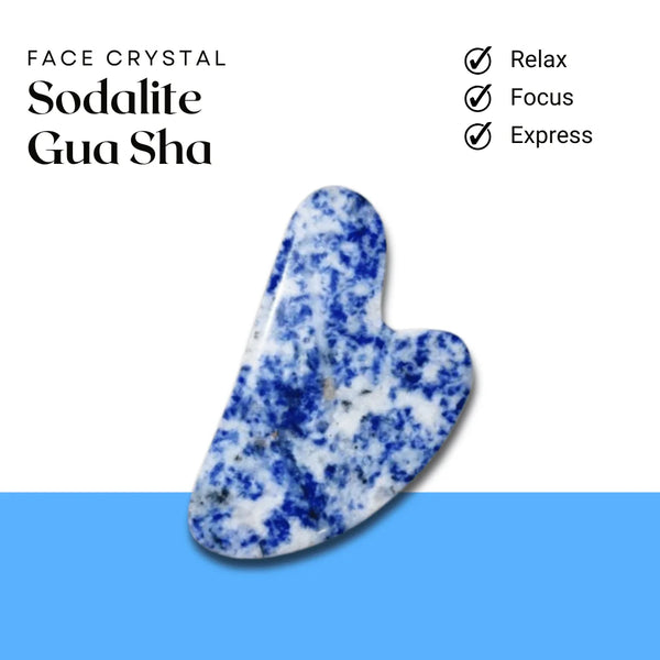 Sodalite Gua Sha face crystal displayed for relaxing, focusing and enhancing facial expression.