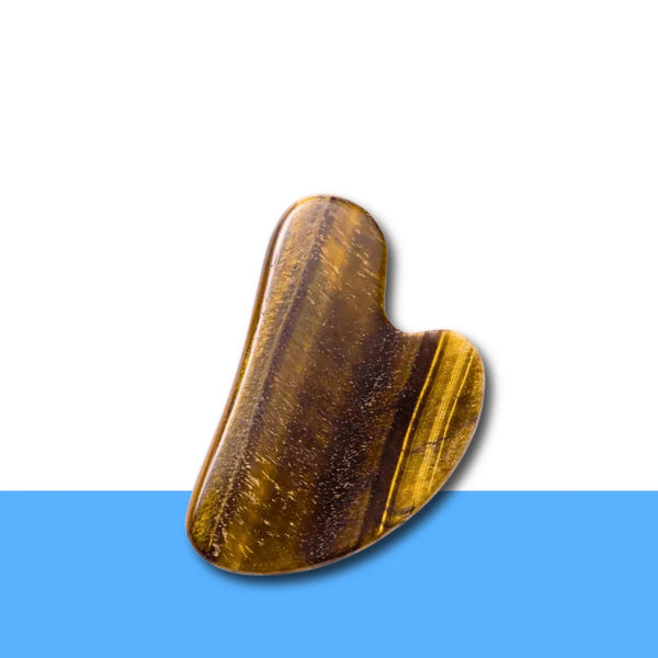 Tiger Eye facial Gua Sha stone shown clearly, supporting energizing massage, willpower and balanced skin tone.
