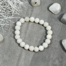 Load image into Gallery viewer, A collection of White Agate bracelet showcasing different styles and sizes along with their White Agate bracelet benefits.
